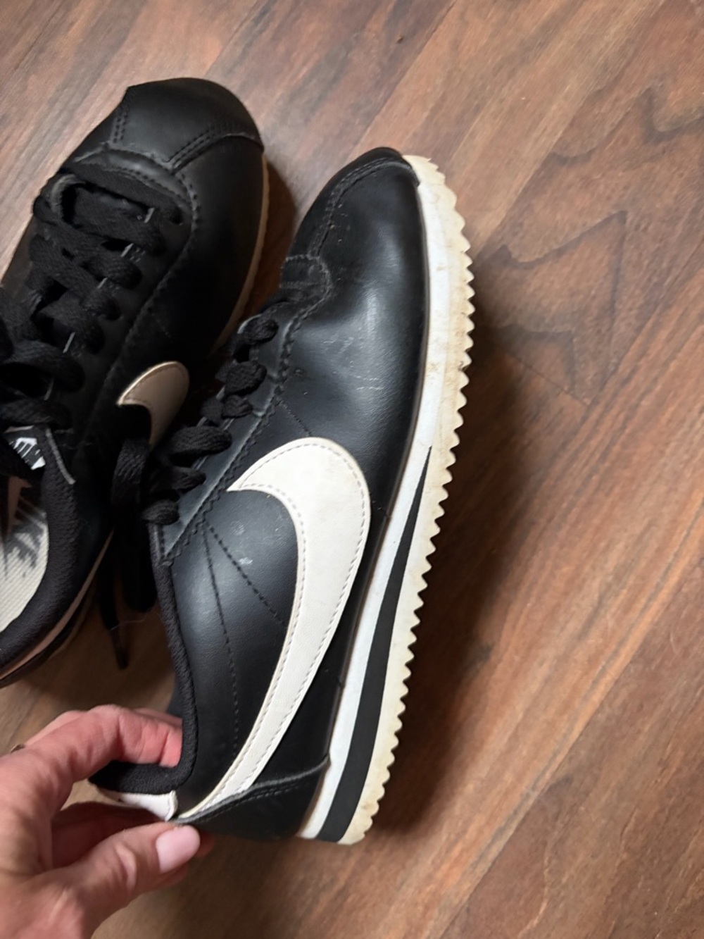 Nike women’s  Black and White Retro Cortez Sneakers